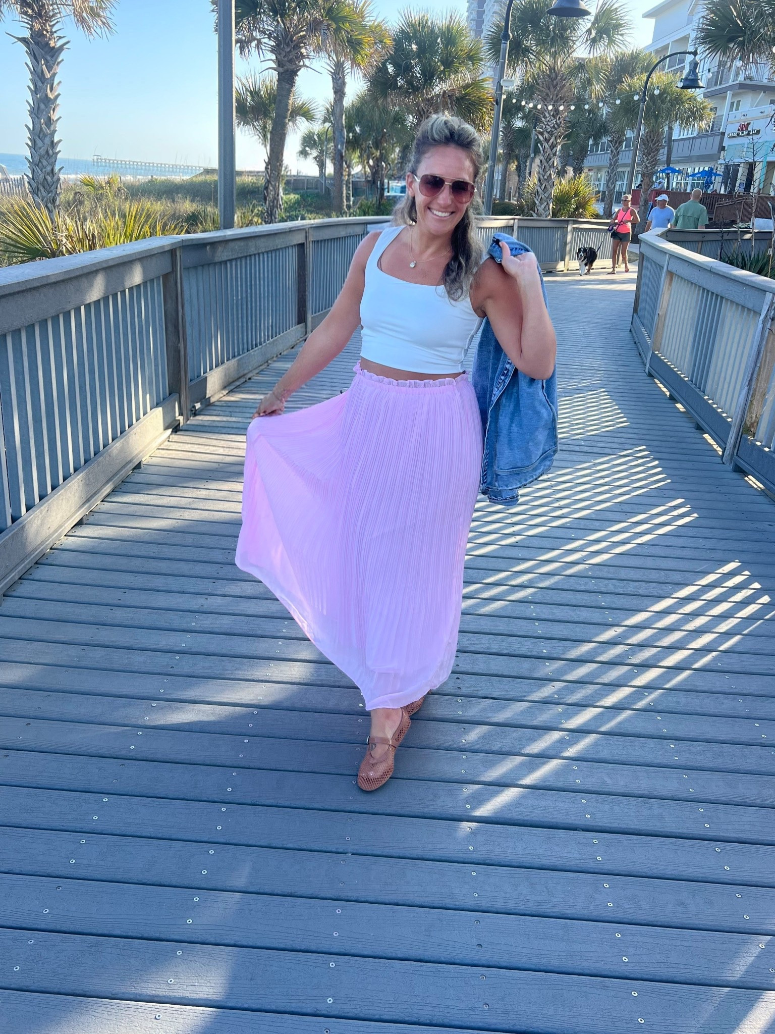 The pleated skirt everyone should have in their closet- and this pink!!! 😍 Wear with a tank, bodysuit, sweater, denim jacket.. 
.
.
Skirt: order tts! I’m wearing a medium
Net shoes: soooo comfy!! Size 8- tts!
.
.
Spring style summer looks outfit ootd denim skirt pleats pleated pink bright date night lunch date girls night out casual classy 

#LTKootd #LTKmomlife #LTKPetite