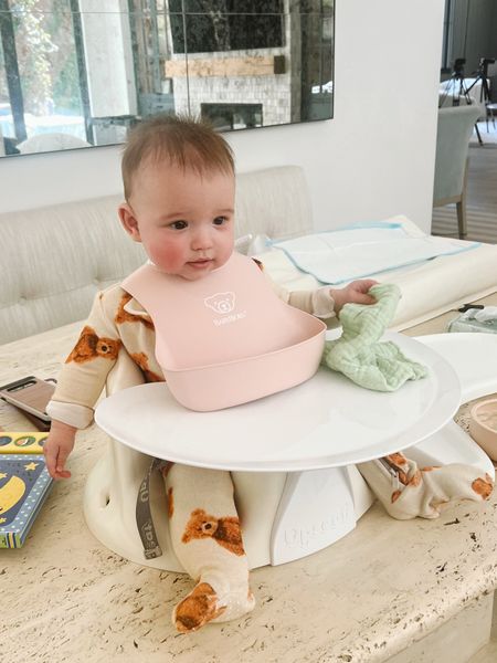 My favorite bib! I like that she can’t bend it and try to put it in her mouth like the silicone ones. The “pearl” necklace gets me and it’s perfectly adjustable! #babybib #babybjorn #babygear 

#LTKfamily #LTKbaby #LTKbump