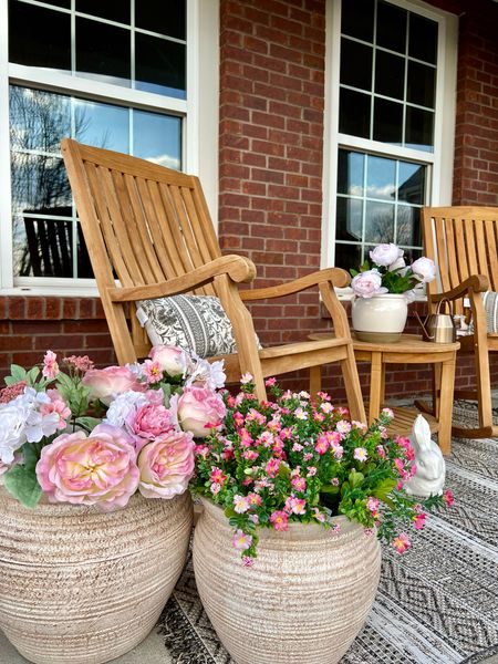 #AD I’m loving this year’s spring porch design featuring some gorgeous, affordable finds from Lowe’s. If you’re shopping for
 new patio furniture, be sure to check out the teak outdoor rocking chair and table set I linked here. It’s so good! I also
  picked up the most stunning set of outdoor planters, a new rug
and some adorable Easter décor that my daughter just
 couldn’t get enough of. Be sure to follow my LTK shop for all the best outdoor Spring finds.

@loweshomeimprovement #lowespartner

#LTKhome #LTKSeasonal #LTKsalealert