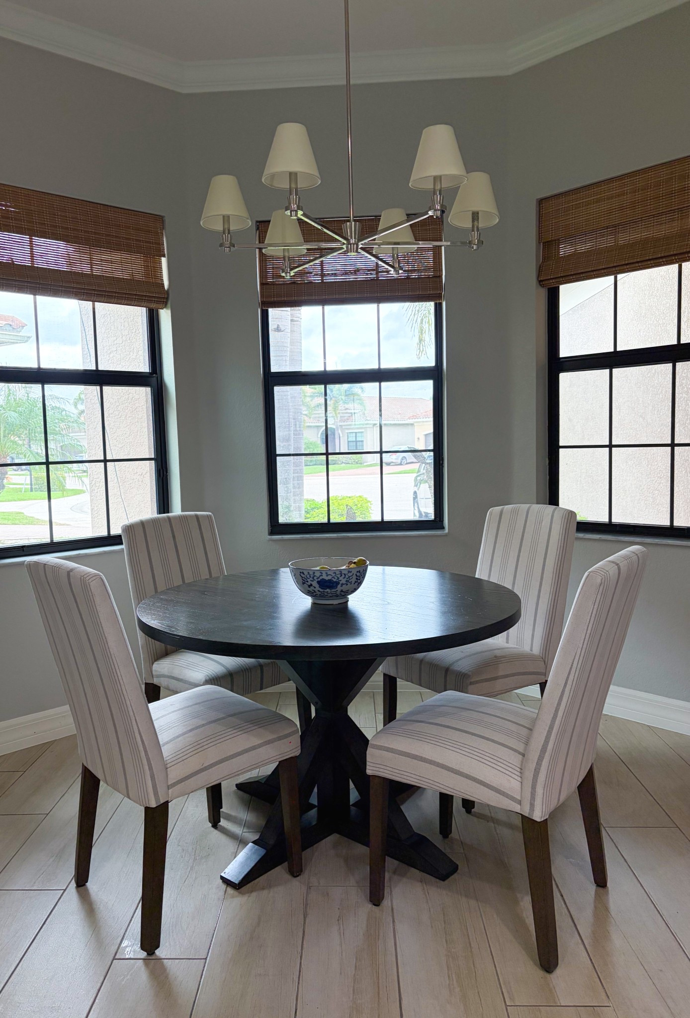 Need a rug and curtains but love how my breakfast nook turned out 

#breakfastnook #kitchen #kitchenchairs #breakfast table #lightfixture #ralphlaureninspired #roundtable #strippedchairs #ralphlauren #wayfair 

#LTKmomlife #LTKHome #LTKdayinmylife