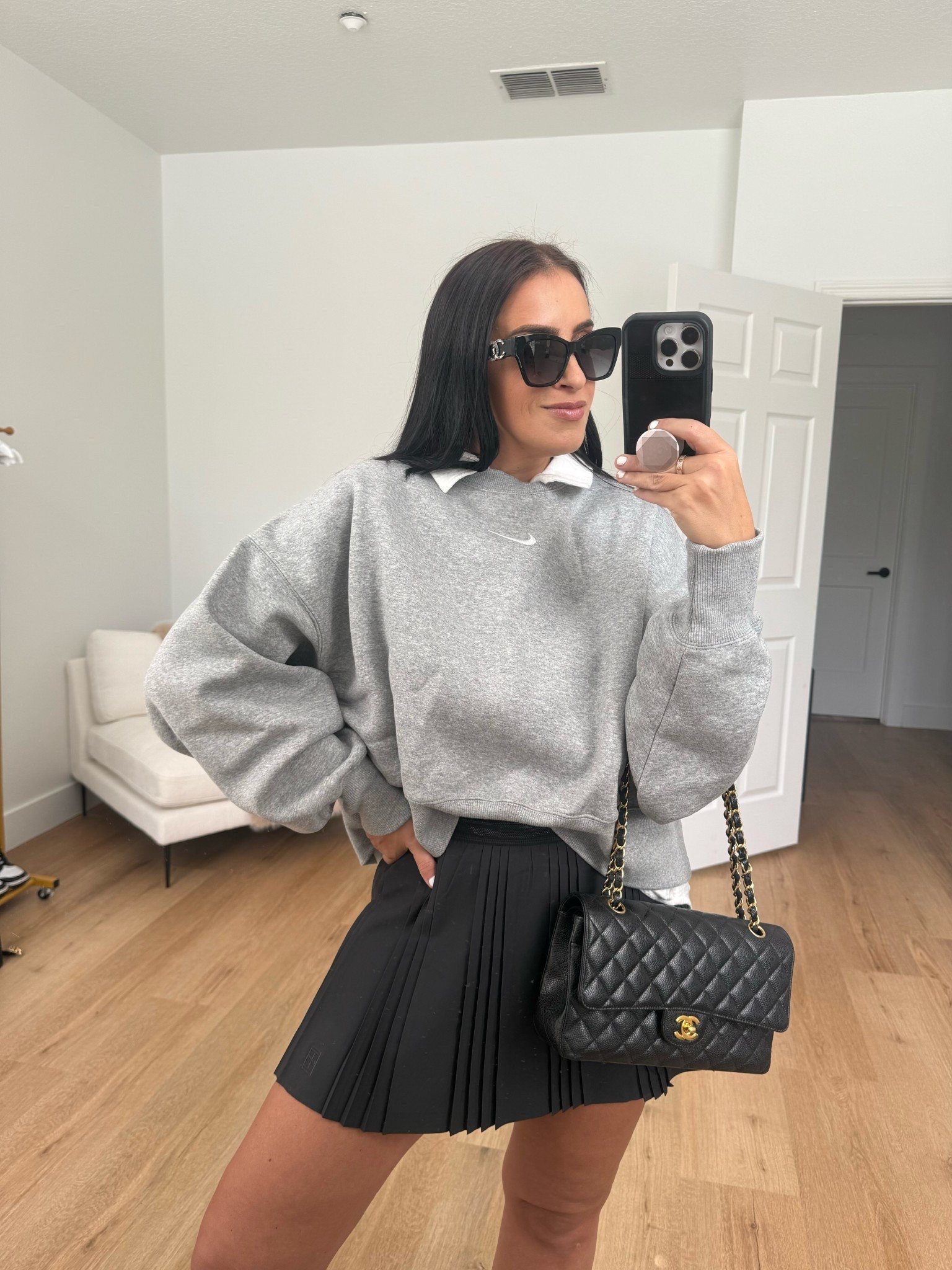 Nike Sportswear Phoenix Fleece
Women's Over-Oversized Crew-Neck Sweatshirt wearing size small. NikeCourt Advantage Women's Dri-FIT Pleated Tennis Skirt size medium. 