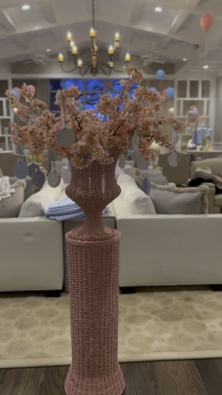 Spring pink flowers and pink wicker urn and pedestal! 