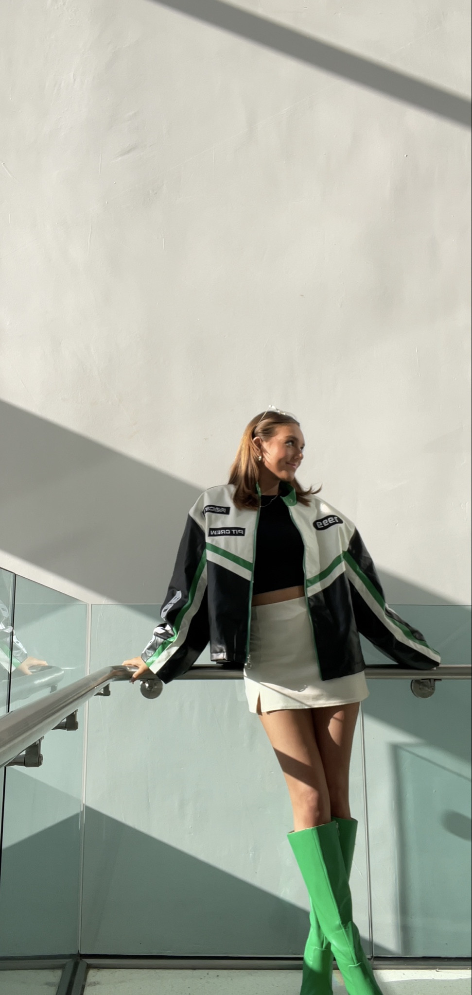 My outfit for NYC. Loved pairing these green knee high boots with this racing jacket 💚🦚

#LTKtravel #LTKshoecrush #LTKstyletip