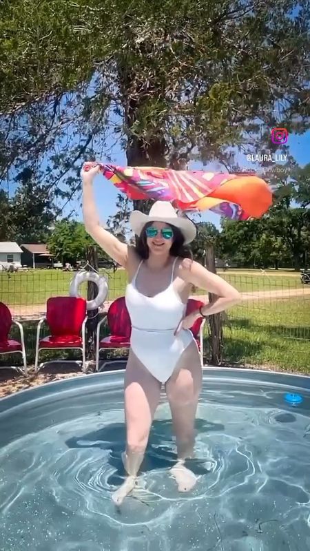Summer swimwear in full swing! Wearing a white one-piece swimsuit, white cowboy hat and a colorful patterned beach towel. The perfect white bathing suit for a bride on her bachelorette party. #vacationoutfit #vacationlooks #swimwear #swimsuit

#LTKswim #LTKunder50 #LTKSeasonal