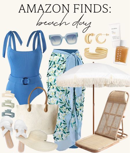Amazon beach day finds! Cute one piece swimsuit, floral sarong, white fringe beach umbrella, foldable rattan beach chair, gold summer accessories, straw beach bag and more! 

#amazonfinds #amazonswim #amazonfashion #beachessentials 

#LTKSeasonal #LTKunder100 #LTKswim