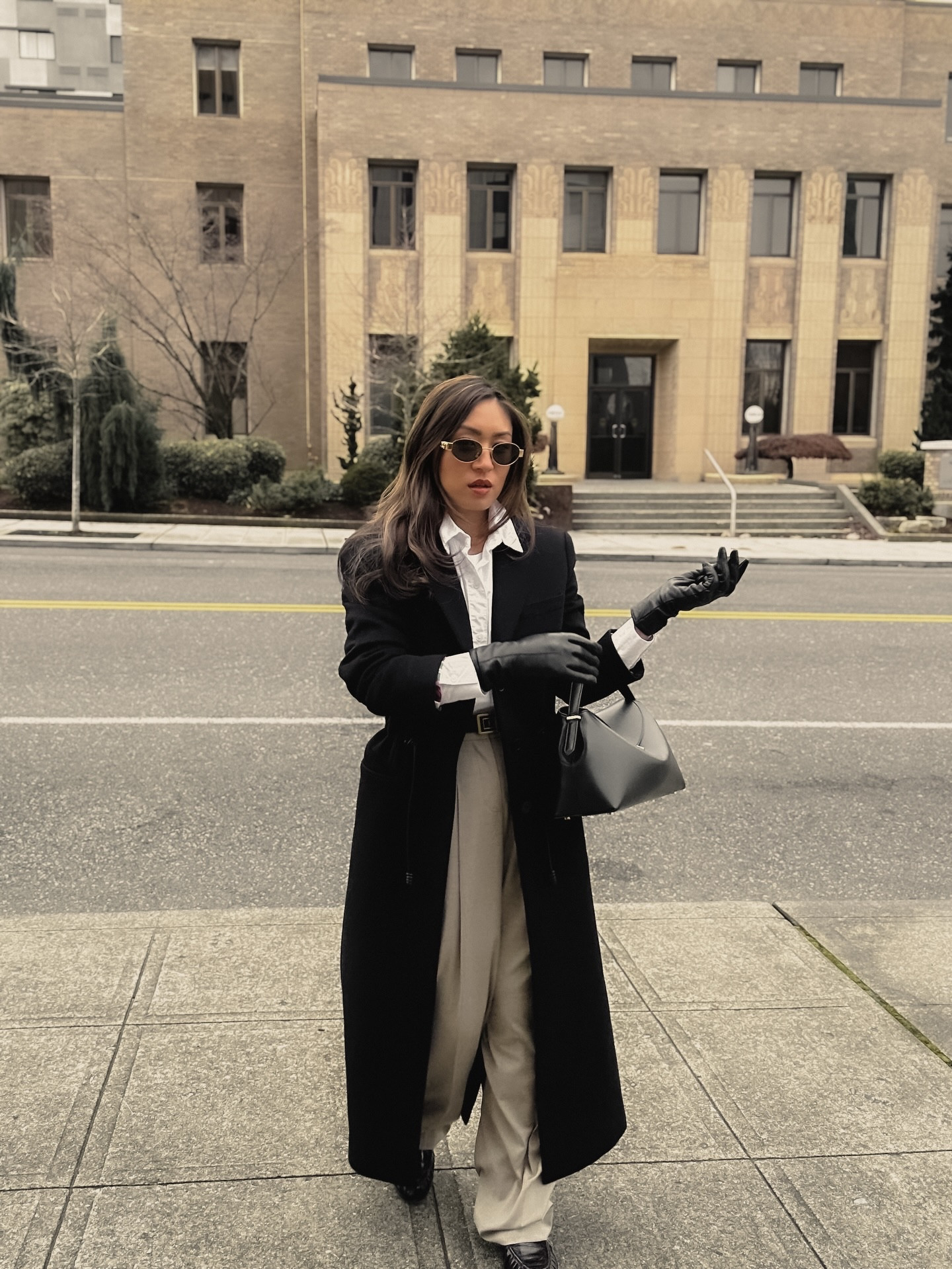 if your winter coat doesn’t sweep the floor is it still iconic? 🖤🫶🏼 living warm in all my long coats this breezy season! !

Outfit details: 👇🏻
🤍 sunnies: @celine 
🤍 trousers: @thefrankieshop 
🤍 bag: @toteme 
🤍 coat: @ferragamo 
🤍 loafers: @ysl 

🔗 Outfit specifics always linked in bio → LTK @amandacapsulewardrobe
⸻

#oldmoneyoutfits #elegantoutfit #timelessoutfit #quietluxurystyle #capsulecloset