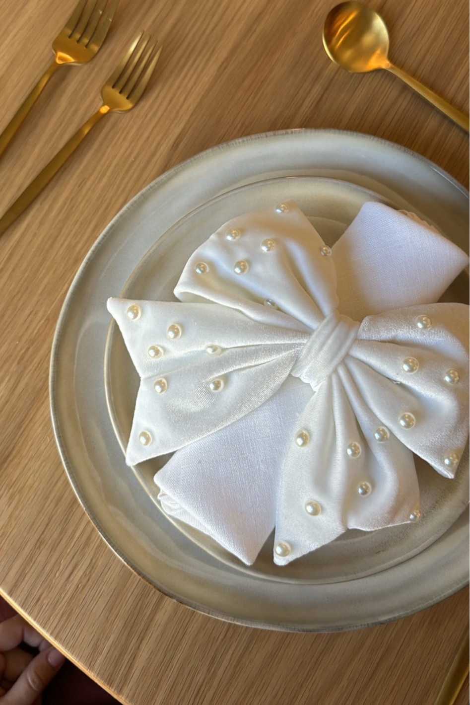 Cute pearl bow napkin ring for your holiday tablescape 

#LTKSeasonal #LTKHoliday #LTKHome