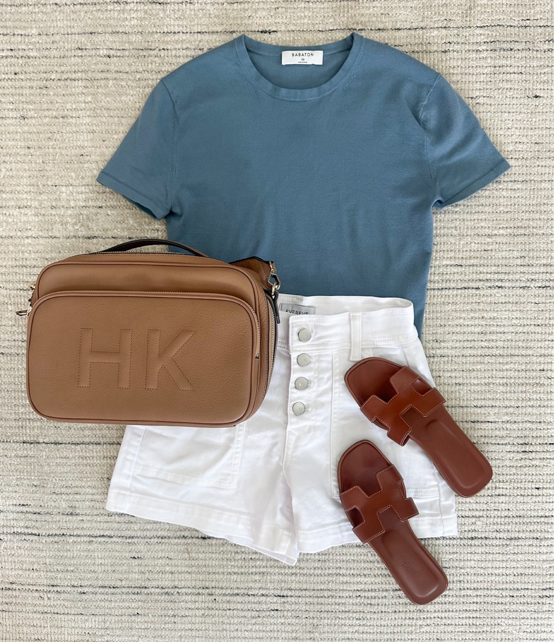 Summer outfit with white button shorts paired with blue knit tee! Super flattering on and can be styled dressy or more casual 

#LTKSeasonal #LTKStyleTip
