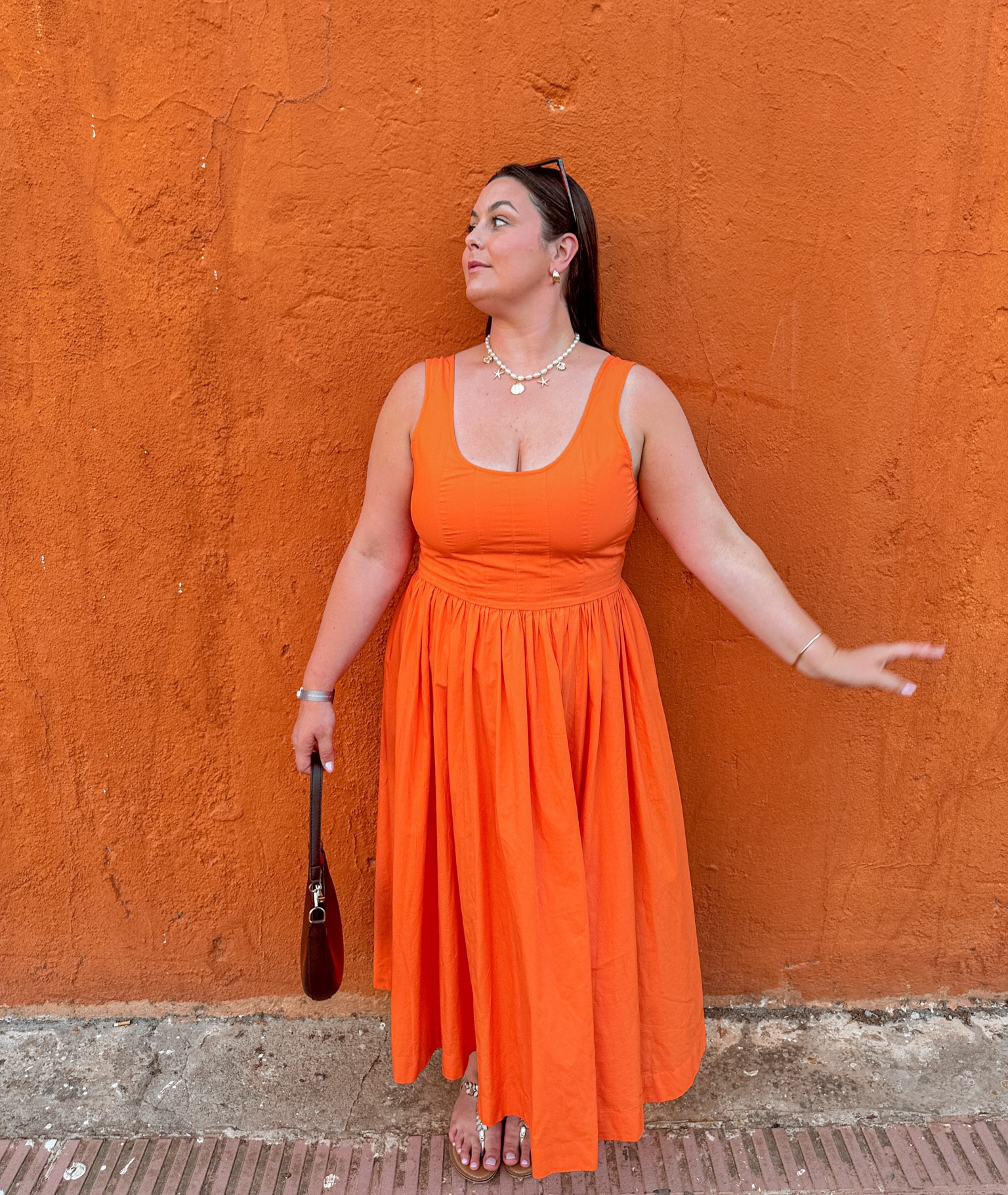 The viral M&S dress of the season… but in orange 🍊 STUNNING and no bra required for my big bust gals. It’s cotton too and super lightweight for summer. 

I’m wearing my usual size of UK 18 long - I’m 5ft 8 for reference. 

#LTKuk #LTKmidsize #LTKplussize