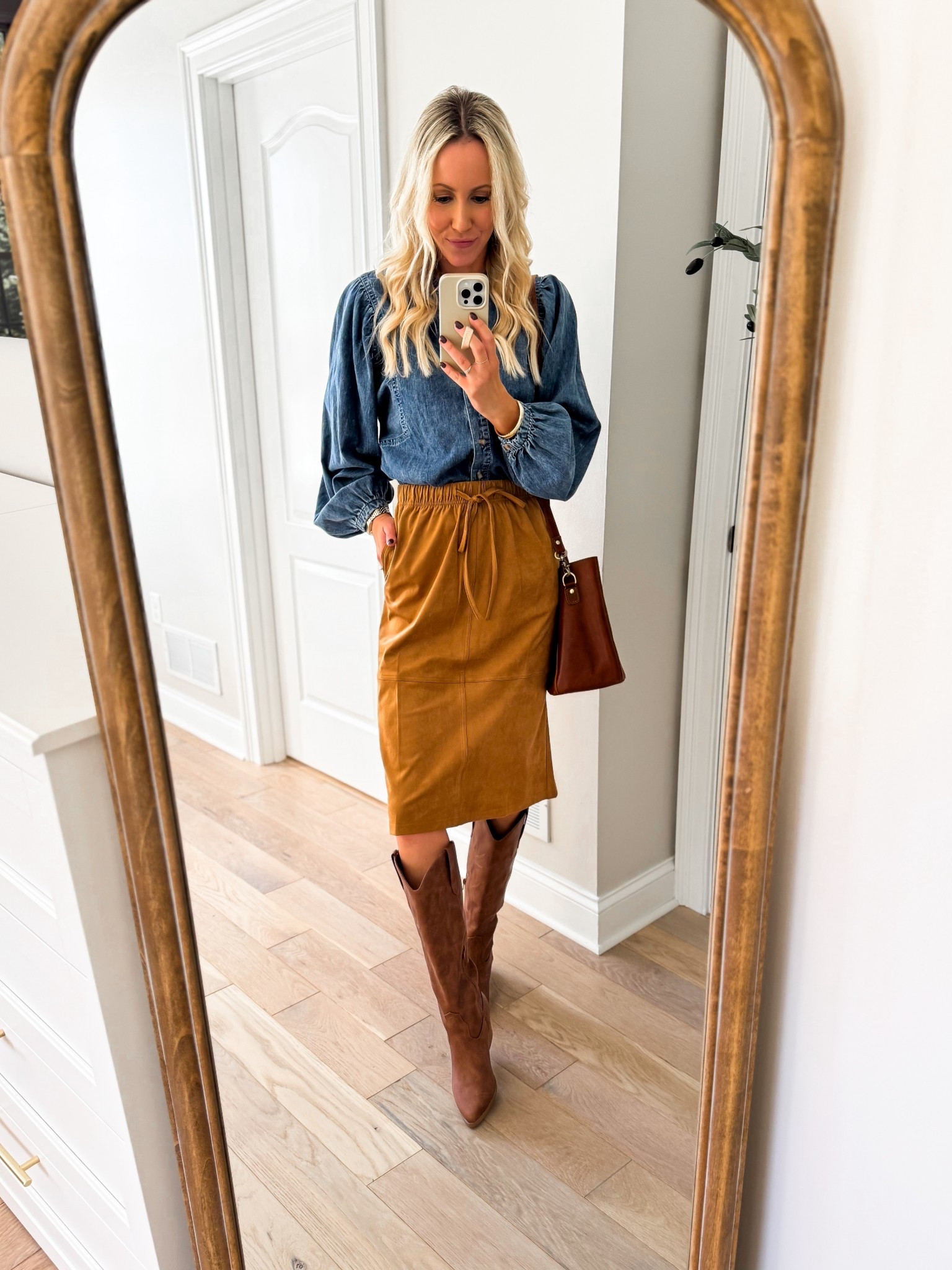 Fall outfit idea! So comfy and yet so elevated and on-trend! This faux suede drawstring midi skirt is available in three colors, sizes XS-XXL. Has pockets! And this denim button down with balloon sleeves is the cutest chambray top! Perfect for teachers and the office, church, date night, and more! 🫶🏻 I’m 5’7” and wearing my true size xs in all. Which new Target find is your fave?👇🏻

#LTKStyleTip #LTKWorkwear #LTKFindsUnder50