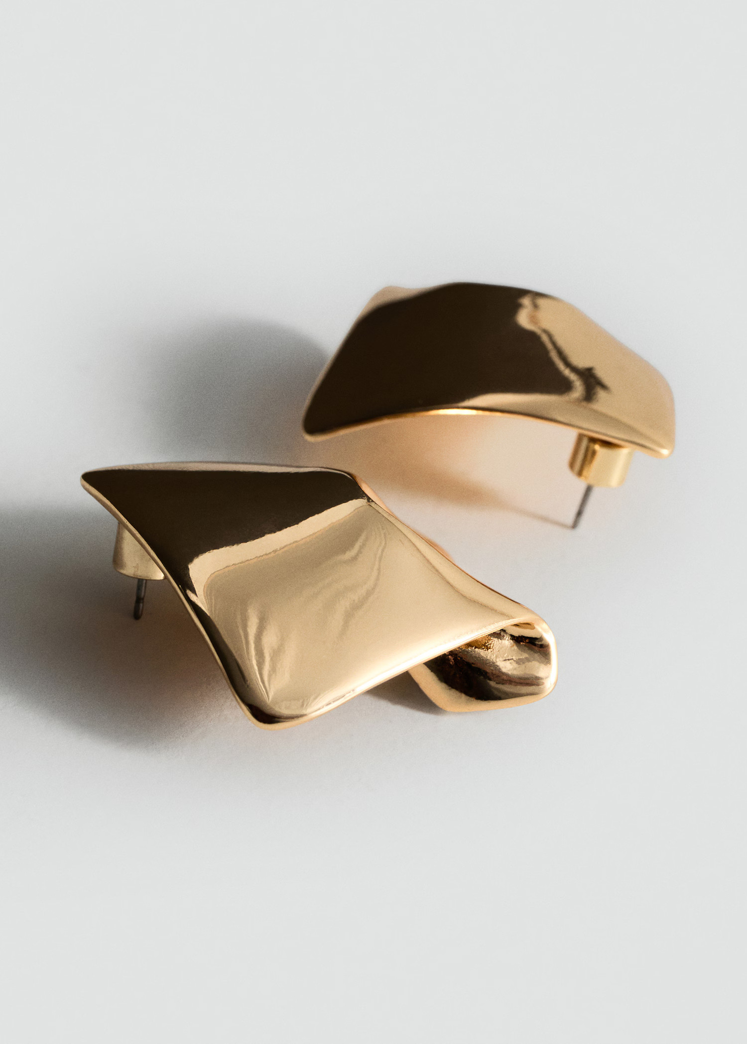 Irregular metallic earrings | Mango (US/MX/AU)