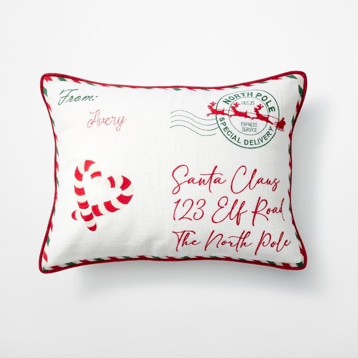 LETTER TO SANTA PILLOW

Send holiday wishes straight to the North Pole. Crafted from soft cotton with charming embroidered details, this decorative pillow is designed to look like a festive letter addressed to Santa Claus, complete with candy canes, a North Pole postmark, and sweet handwritten accents

#LTKSeasonal #LTKHome #LTKmomlife