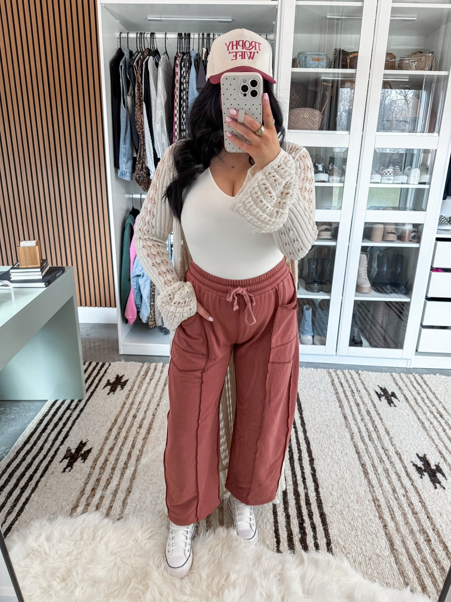 Bodysuit - medium
Cardigan - small
Pants - small (brick red color)

*My exact hat is currently sold out, but I still linked it in case they restock! Also linked two alternatives that would look so cute as well!

These pants are a closet must have! The quality is amazing, they come in so many color options & I love the wide leg style! I paired them with this white bodysuit and added this cute knit duster! Finished the look with a fun hat & my white leather platform converse sneakers.



#LTKBump #LTKootd