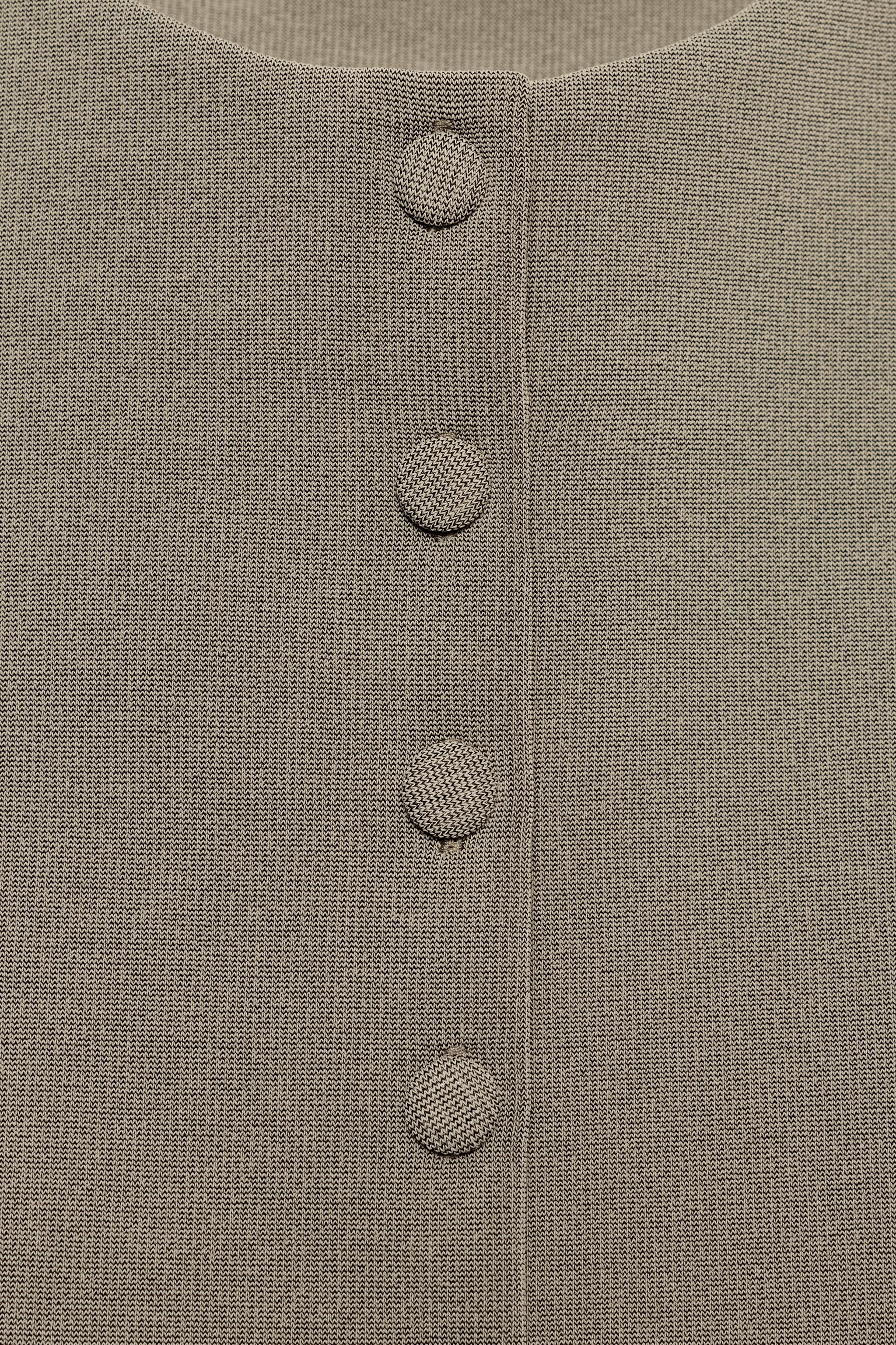 ZARA | Vest with a round neckline and sleeveless design. Straight hem. Front closure with matching fabri... — shop this pick from Emily's edit