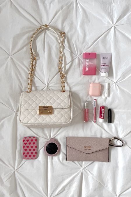 what’s in my bag | bag, girly , bag essentials, lipgloss, mini mirror, small mirror, hand sanitizer, perfume

#LTKFind #LTKbeauty #LTKitbag
