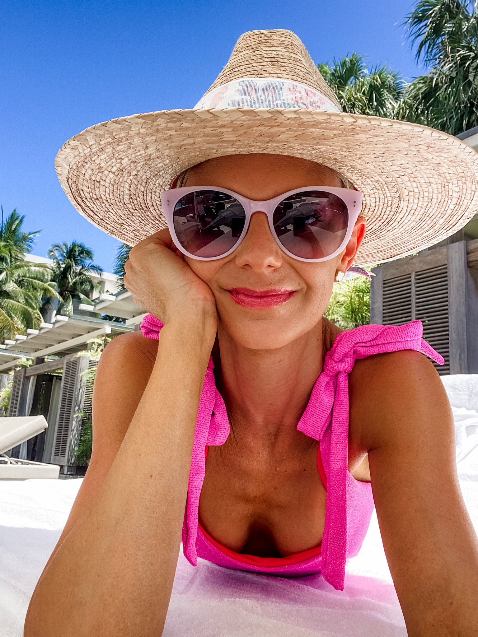 Living my best Barbie girl life with these pink sunglasses, pink swimsuit and pink beach hat  

#LTKSwim #LTKOver40 #LTKTravel