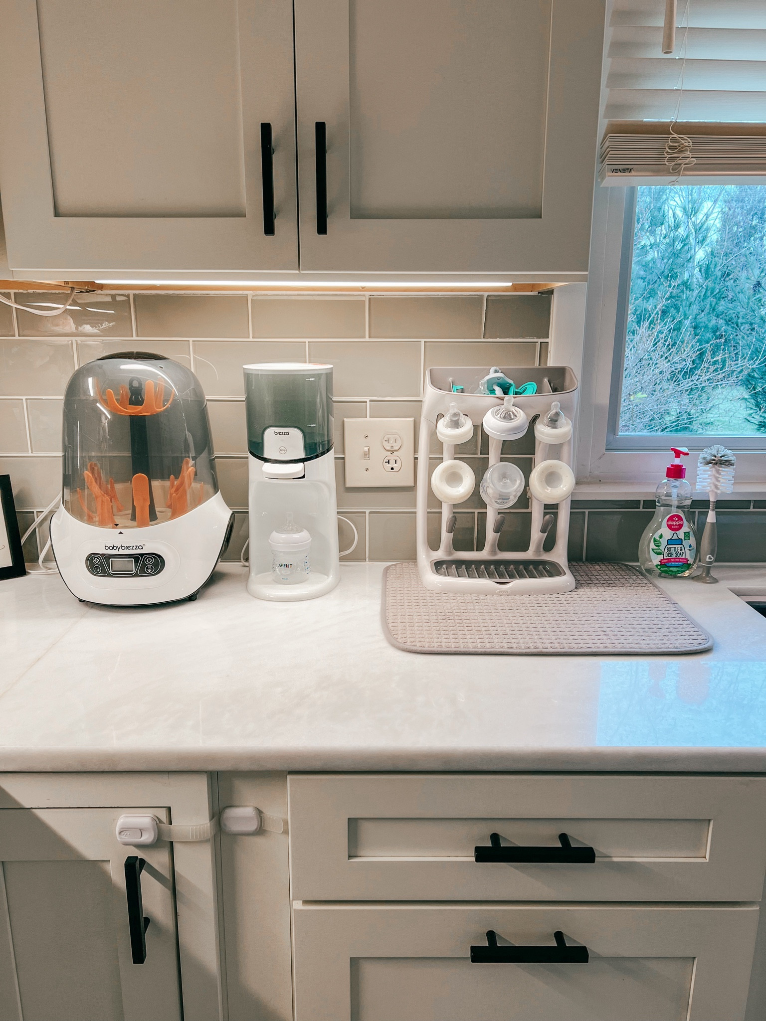 We are ready for you baby girl! It feels so good to get so organized before she arrives and knowing what I need/used the most with brycen has helped me tremendously prepare for her! Will share all the newborn must haves on here for you! 

I used the Mam, Avent, and Comotomo bottles with my first and he took to each one at a different phase so make sure you have a variety. If you're like me and don't love counter clutter this drying rack is my favorite since it takes up such a little space on our counter! 

Newborn must haves, baby brezza, baby bottles, baby must haves, baby bottle soap, baby bottle brush, kitchen organization 

#LTKbump #LTKfindsunder50 #LTKbaby