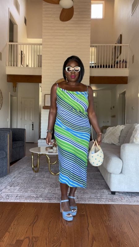 Love a simple cowl neck dress and this pattern just added that little extra flare that I love! Styled it with LOFT sandal heels, gold earrings, sunglasses and woven bucket bag!!

#LTKstyletip #LTKVideo #LTKitbag