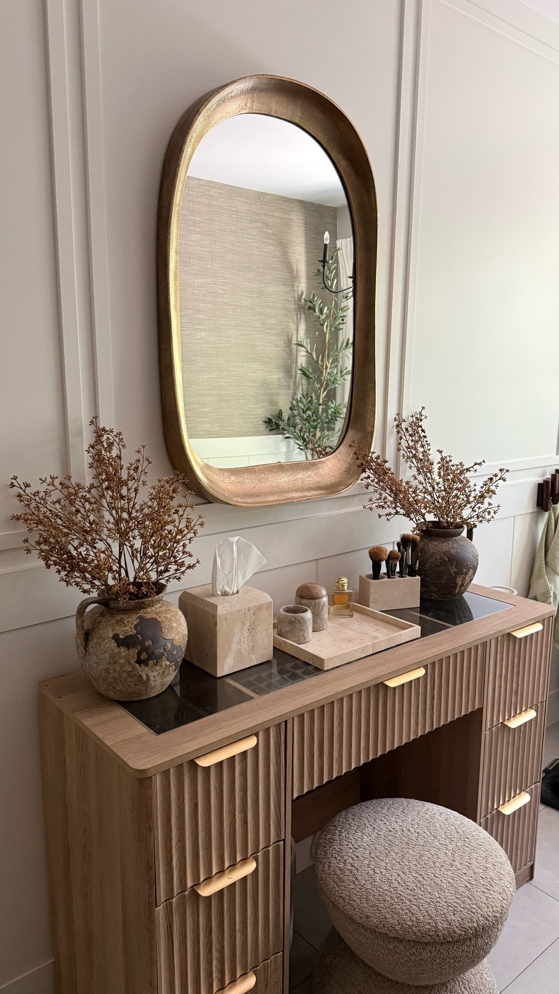 I’m so happy with my vanity set up! I decided to not use the mirror that came with the vanity and went with this gorgeous bronze mirror.
