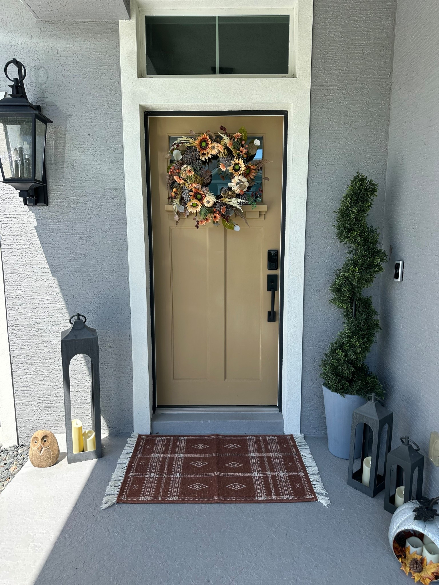 New rug #fallrug #fallentry #fallwreath #halolock #doorhandke #lanterns #entryway #topiary 

#LTKSaleAlert #LTKSeasonal #LTKHome