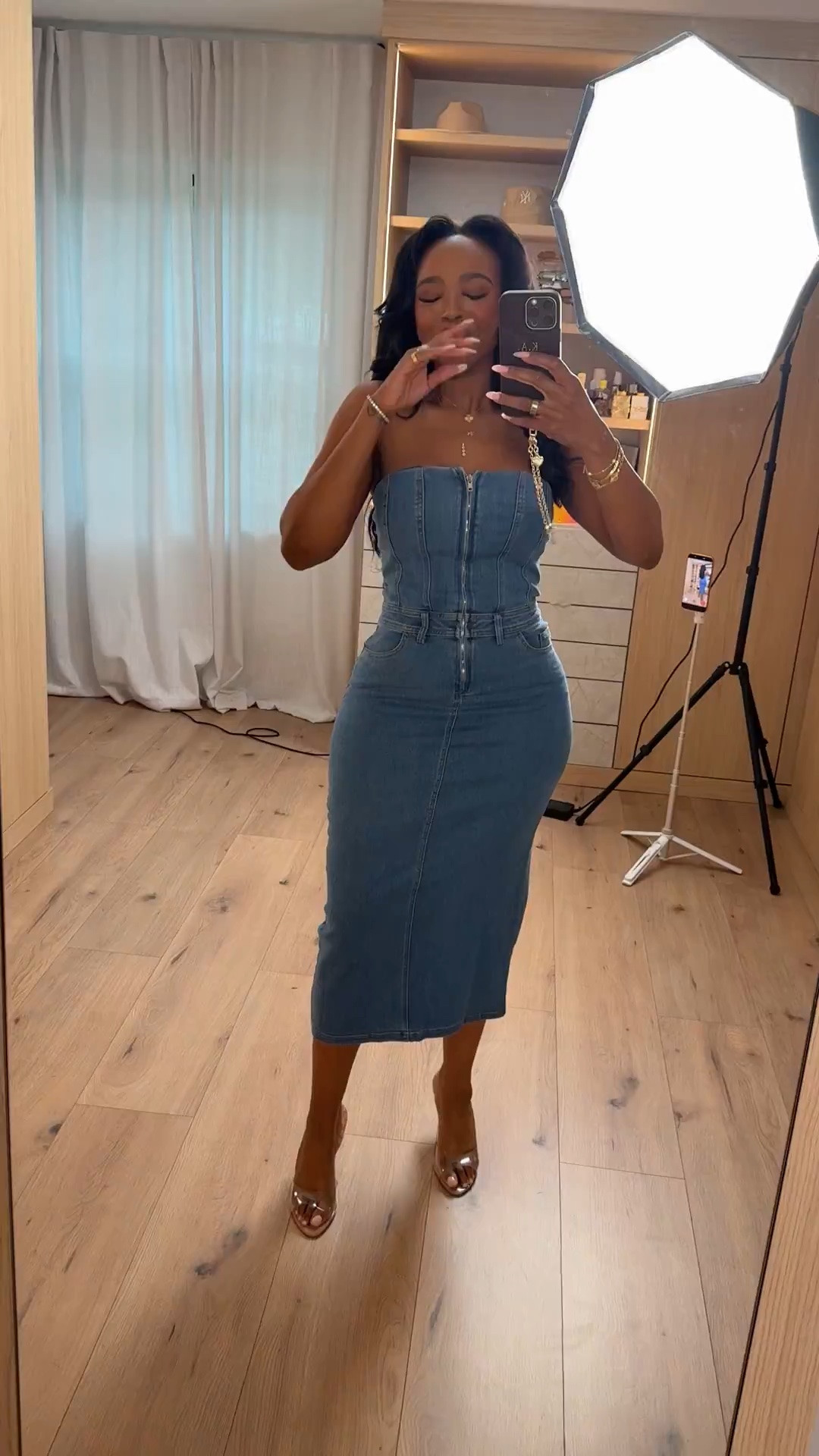 Hi Babes! 💙

Denim, but make it elevated. This structured denim midi dress hugs in all the right places and is one of those pieces you can dress up with heels or keep casual with sandals.

Fit Details:
• Strapless denim midi dress
• Front zip detail
• Figure-flattering silhouette
• Nude heels
• Gold jewelry

Where to wear:
• Brunch
• Date night
• Girls' night out
• Concert
• Vacation
• Weekend events

Everything is linked below!

xx, Kira | IG: KirasFashionFinds

Measurements: 5'3" | Wearing Size XS
