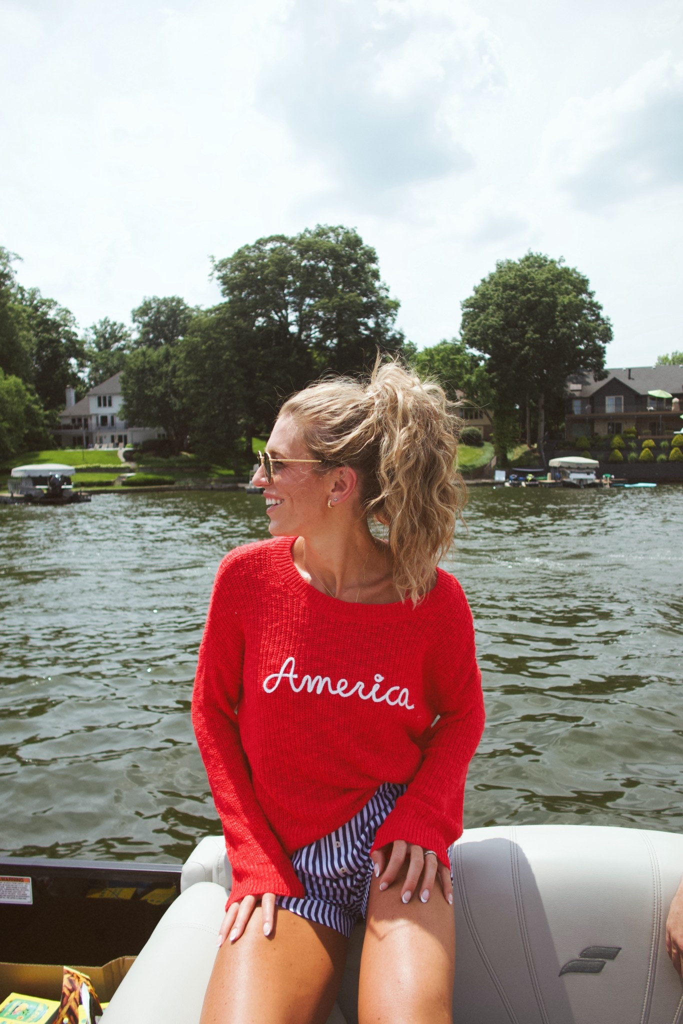 My July 4th outfit on the lake! Size medium in the america knitted sweater and size small (sized down) in the striped boxer shorts 

Also linked my hair waver. It’s the 1.25"