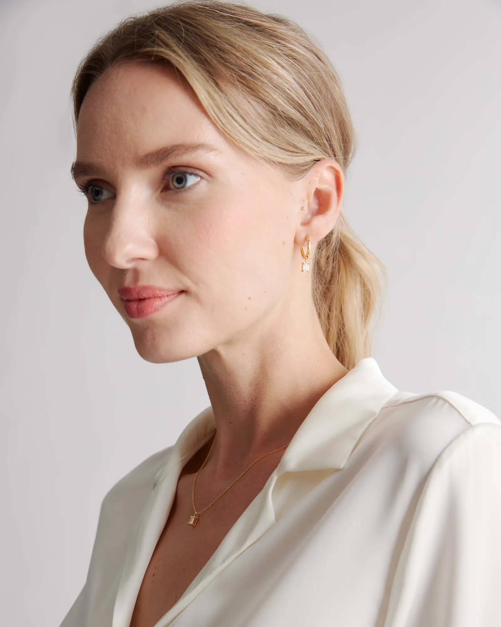 Emerald Cut Topaz Dangle Hoops | Quince