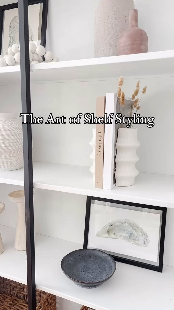 Creating a harmonious blend of textures and neutral tones to bring this cabinet to life 🤍 Thoughtfully layered with coastal-inspired pieces for a look that’s both serene and timeless. Which detail catches your eye? ✨ #ShelfStyling #NeutralDecor #TheEastCoastHome