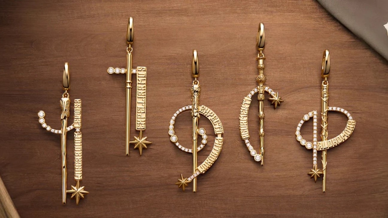 Gold and sparkle elegant Harry Potter wand necklaces.
