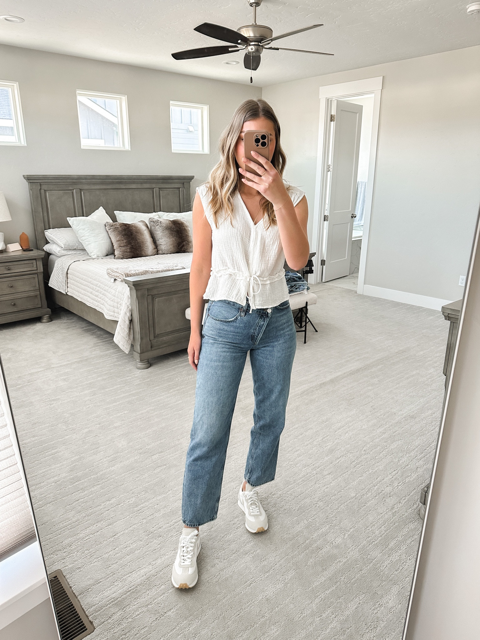 Veja sneakers, agolde crisscross jeans, crinkled cotton peplum top 

#LTKtravel