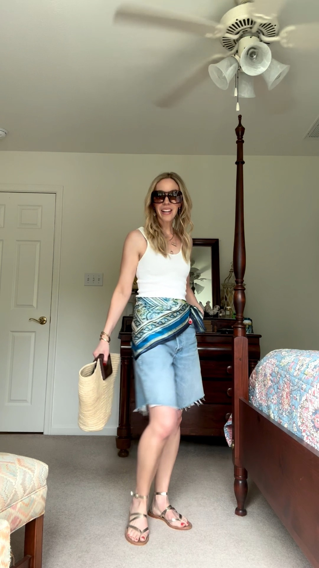 Summer casual outfit, vacation outfit, silk scarf tied at waist, denim bermuda shorts, Le Tanneur straw tote bag

#LTKdayinmylife #LTKootd #LTKTravel