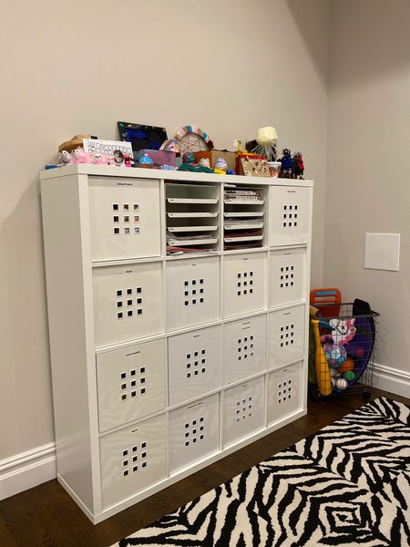 This client wanted her children’s artwork and supplies neat, contained and categorized. These plastic bins are great and easy to clean, and the shelving unit is one of our go-to’s for playrooms!

#LTKhome #LTKkids #LTKfamily