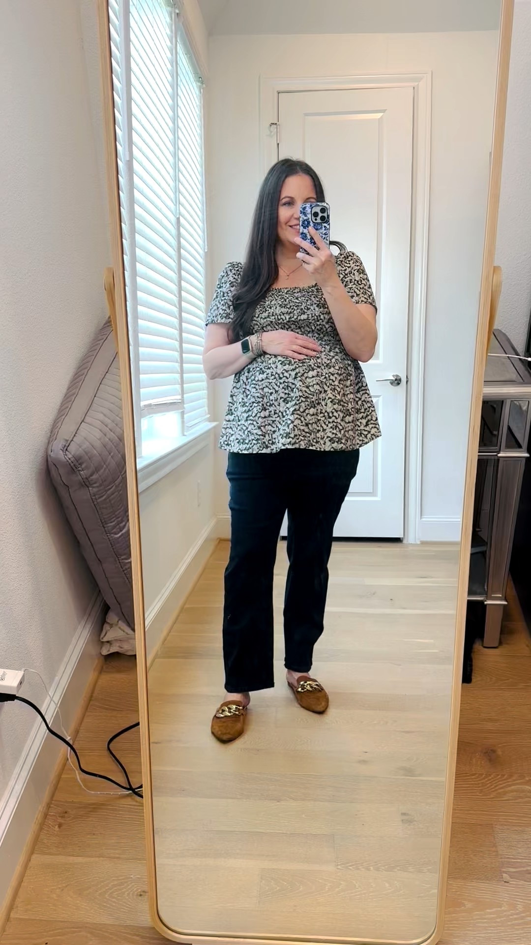 Sharing an easy go-to from my current lineup of maternity outfits that works for both everyday wear and the office. If you’re looking for a chic pregnancy work outfit idea, this one is so comfortable while still feeling put together. The smocked puff sleeve top adds a feminine touch and pairs perfectly with the best black maternity jeans for a sleek, flattering fit.

I finished the look with simple brown slides to keep it effortless and wearable. This outfit is the perfect example of dressy casual outfits done right—polished, comfortable, and very much my everyday mom style.

Everything is linked below to recreate this bump-friendly look! 

#LTKSeasonal #LTKWorkwear #LTKBump