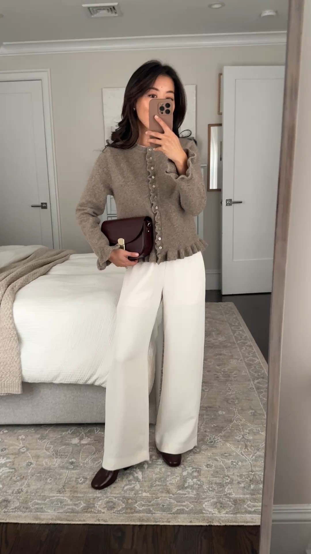 Cozy elevated casual outfit. What I wore to our kids holiday concert.

• Zara ruffle cardigan, size small. Similar in navy or stripes. Cozy, not itchy material. (I shrunk it slightly in machine dryer.)

• Aritzia lodge trousers 2XS short, drapey fluid fabric, stretch waist, wrinkle resistant, short length for petites.

• Sezane Paulette boots in glossy chocolate size 4, but fits like US 5. 

(The similar sezane Aline boot style linked in a stretchy leather fits smaller and the U.S. 4 is more like a true size 4 to 4.5.)

• Sezane Claude bag

Holiday outfit ideas, petite friendly, easy mom outfit

#LTKPetite #LTKHoliday #LTKWorkwear