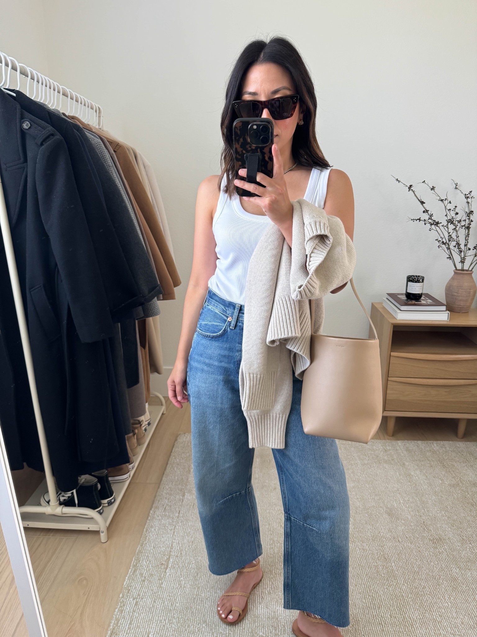 Citizens of Humanity Miro jeans - styled multiple ways. My most worn barrels right now. Curve is only slight, which makes them more versatile. The wash is stunning and can be worn year-round. These do run big, I size down to a 24.

Madewell tank small
Citizens of Humanity Miro jeans 24, cut hems. Run big
Ancient Greek sandals 35
The Row tote small
Quince cotton sweater xs
Celine sunglasses

Petite style, jeans 

#LTKPetite #LTKSeasonal