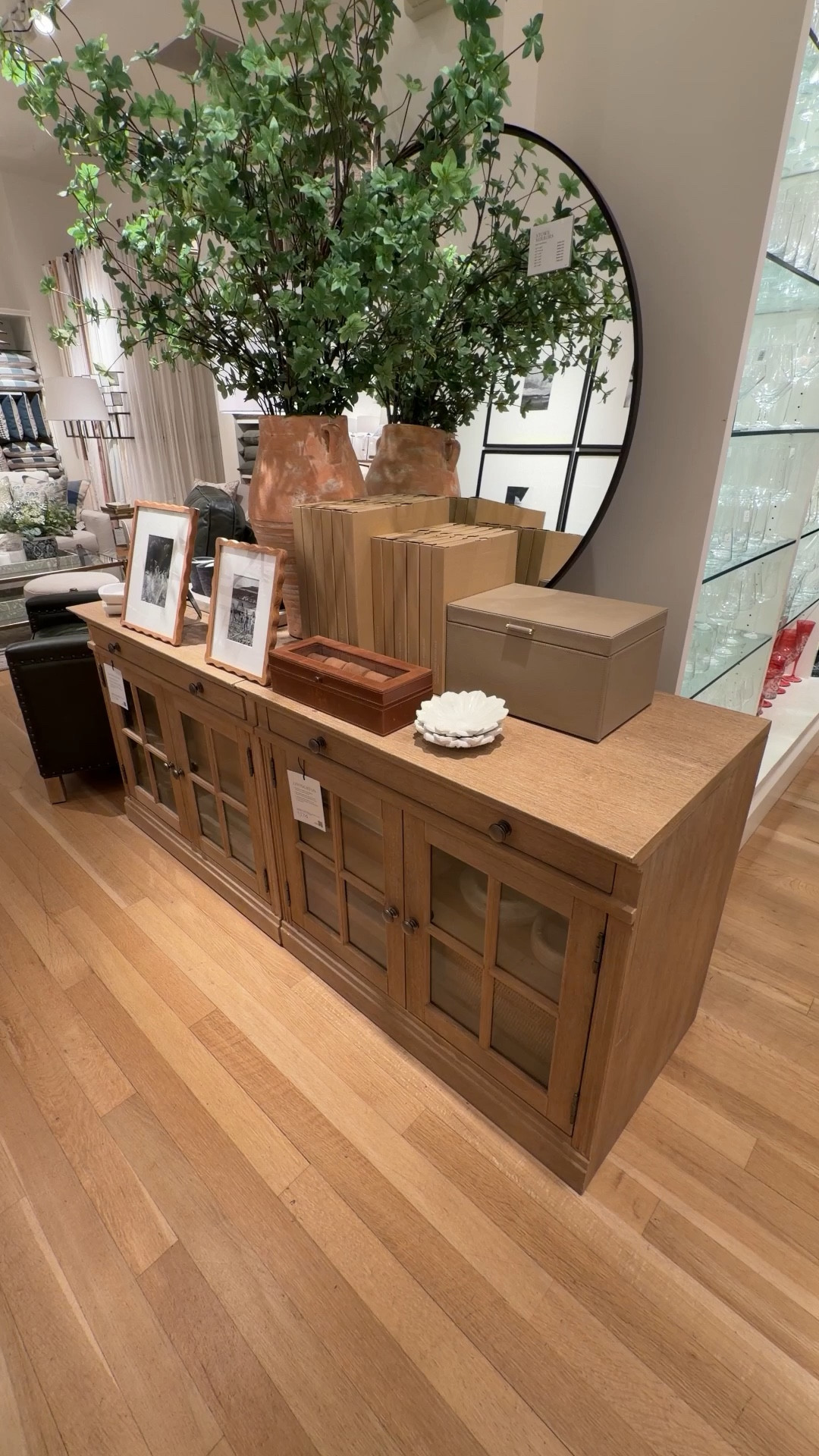 Pottery Barn living room inspo!✨ The Livingston Media Console with Glass Cabinets is such a beautiful blend of classic style and practical storage. 🤎 The glass cabinet doors are perfect for displaying décor while keeping media pieces organized, and the solid meranti wood frame gives it that timeless Pottery Barn look. 👀  Also available in multiple finishes—linked this console and similar media cabinet styles! 💫 #PotteryBarn #LivingRoomInspo #Sideboard

#LTKHome #LTKSaleAlert