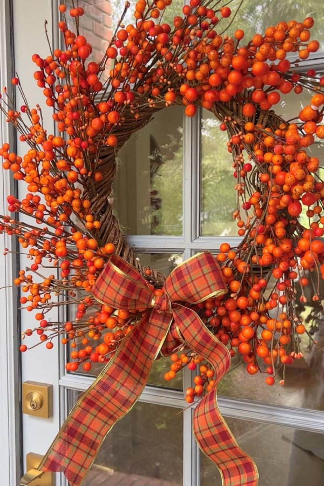 This fall wreath with berries is so pretty and the perfect size for our double front doors! On sale too! I added a bow in a pretty fall plaid 💕

#LTKsalealert #LTKfindsunder100 #LTKhome