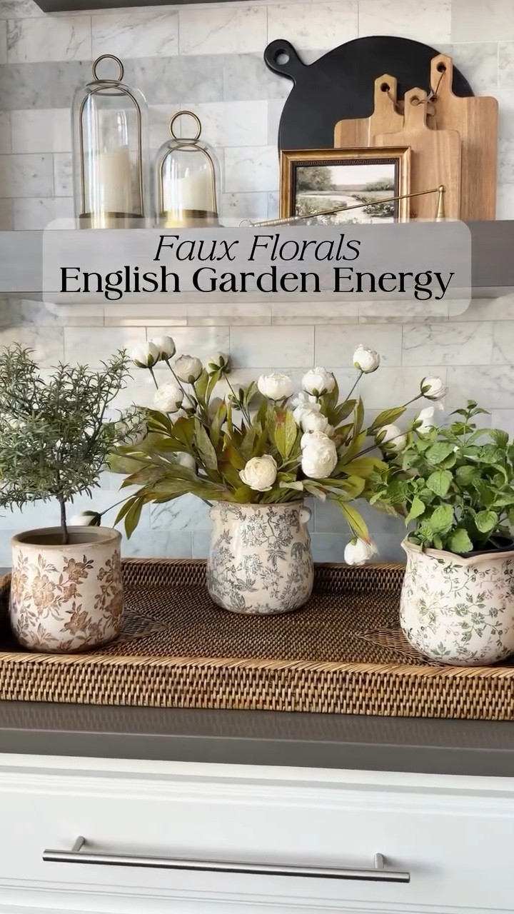 ✨ I’m obsessed with these vintage style floral planters!! I paired three with my favorite faux herbs and florals and they work for spring, summer, fall… honestly year round. You’ve probably spotted them in my kitchen! They’re one of those pieces I never get tired of styling 💚

✨Save this for later if you’re thinking about what to style on your kitchen counters 

#englishgarden #fauxflorals #inspiremehomedecor 
Amazon home decor, English garden decor, outdoor planters, faux herbs, faux florals, kitchen decor

#LTKSeasonal #LTKHome