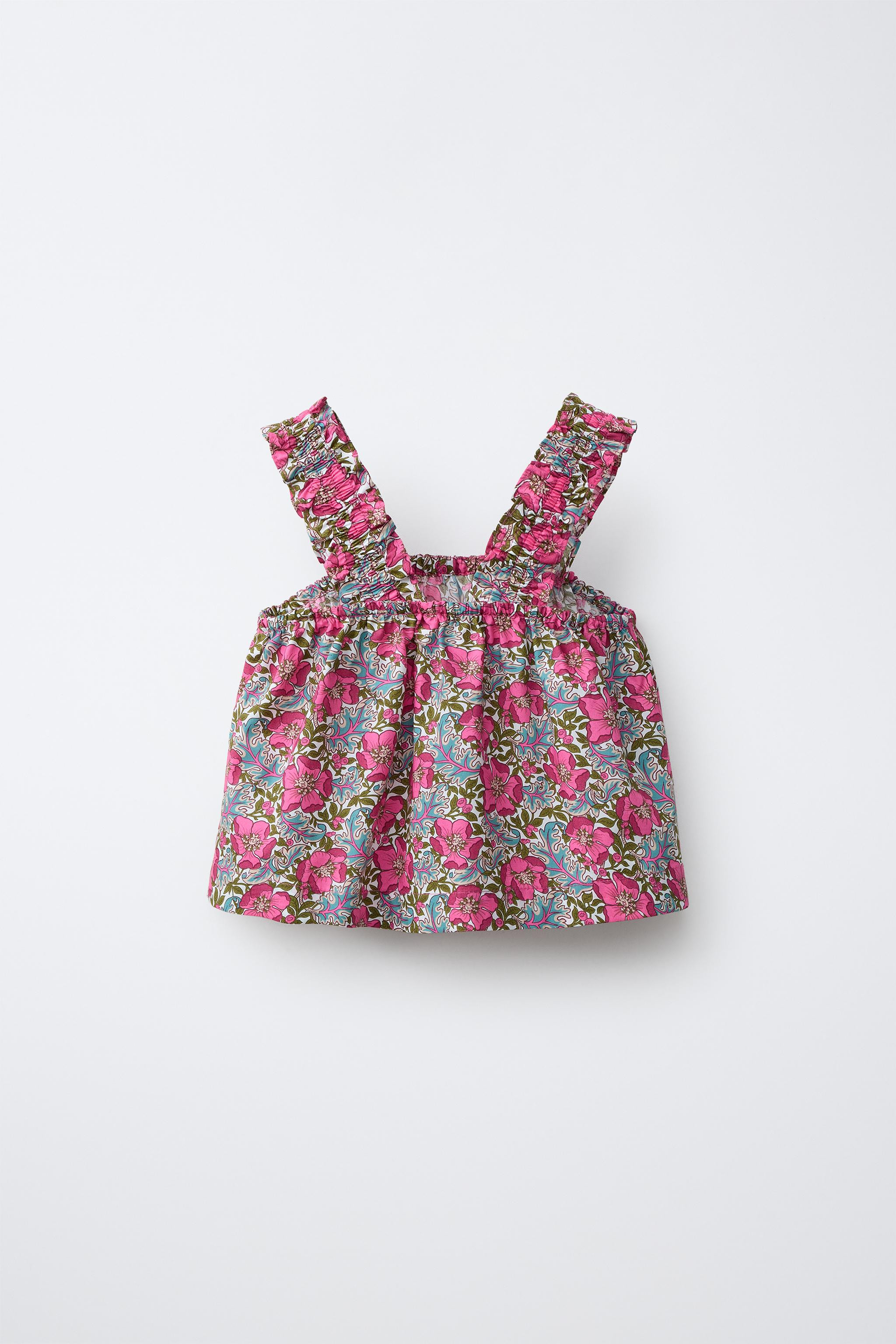 DescriptionContentsMeasurementsDescriptionStraight neck top with straps. Floral print. Made with ... | Zara US
