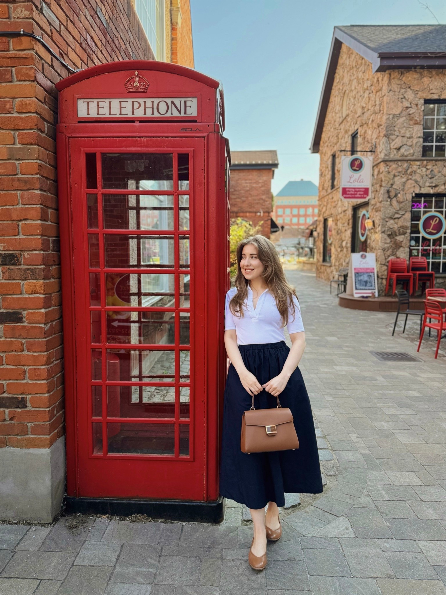 White collar shirt. Navy poplin skirt. Brown leather accessories. 

#LTKsummer #LTKspring #LTKcanada