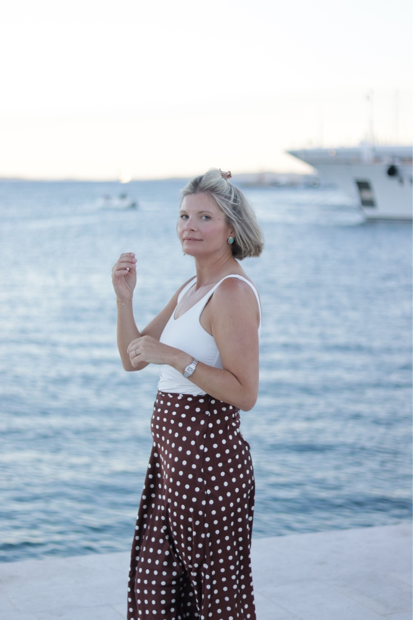 Brown and white silk midi skirt with lace TTs
Built in bra tank TTS
Turquoise and gold earrings

#LTKTravel #LTKOver40