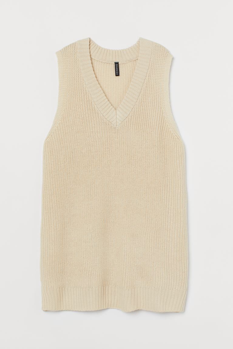 Short sweater vest dress in a soft double knit. V-neck, slits at sides, and wide ribbing at neckl... | H&M (US)