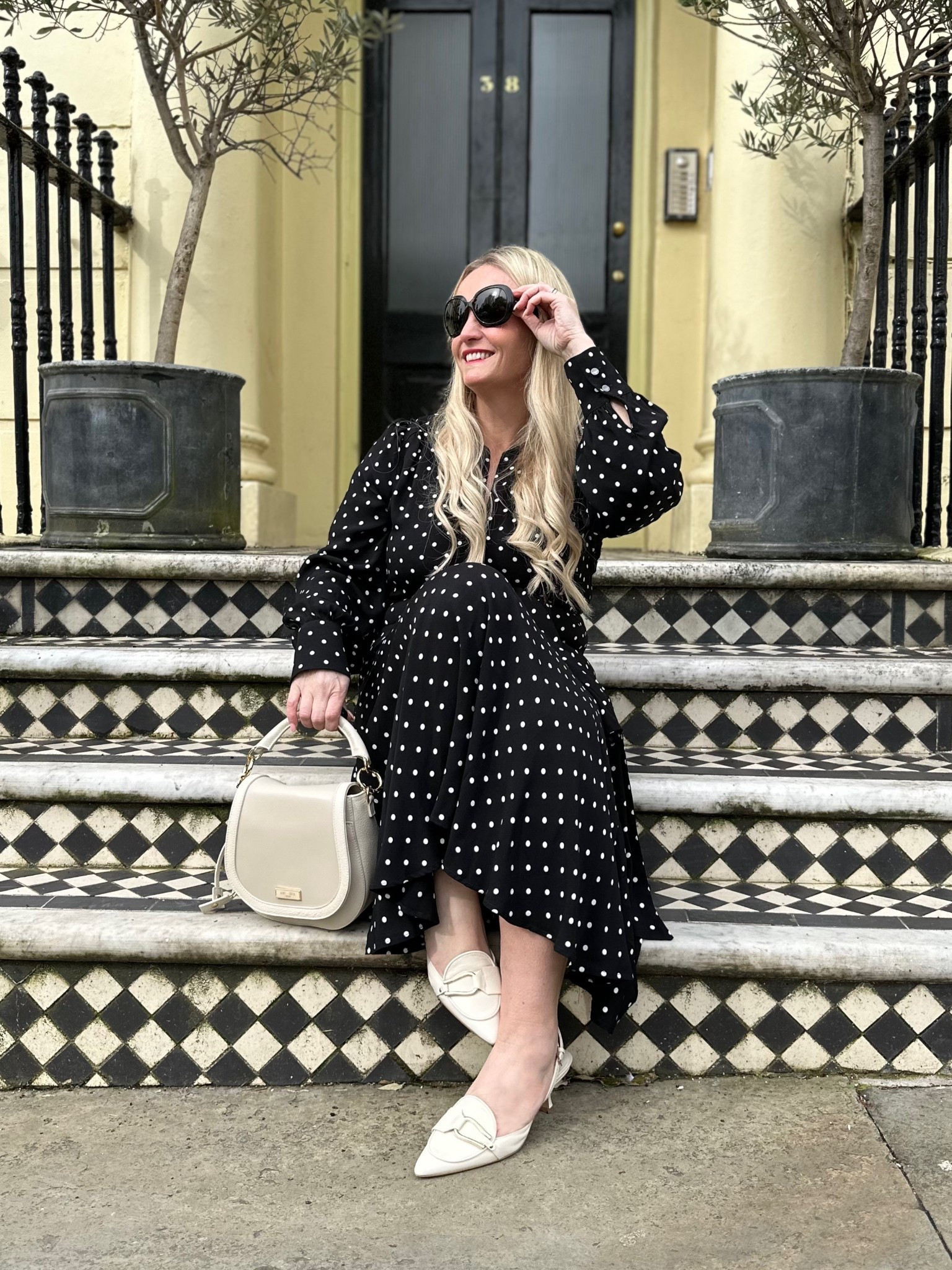 Take one favourite polka dot dress and level it up for spring with the addition of some beautiful cream accessories 🤍
I’ve been wearing my black polka dot @saintandsofia Adaline zip up dress on repeat ever since it arrived, usually styling it with a
black bag and boots. When I saw that Saint + Sofia had released their iconic saddle bag in two new colours for spring, cream and denim, I was so excited as the black one is one of my most used handbags!
It was hard to choose as both are gorgeous but I knew this cream pure leather one would go with so many outfits. And the Bridget sling back heels are a perfect match. The perfect accessories to add a touch of spring to any outfit. 

#LTKspring #LTKstyletip #LTKdresses