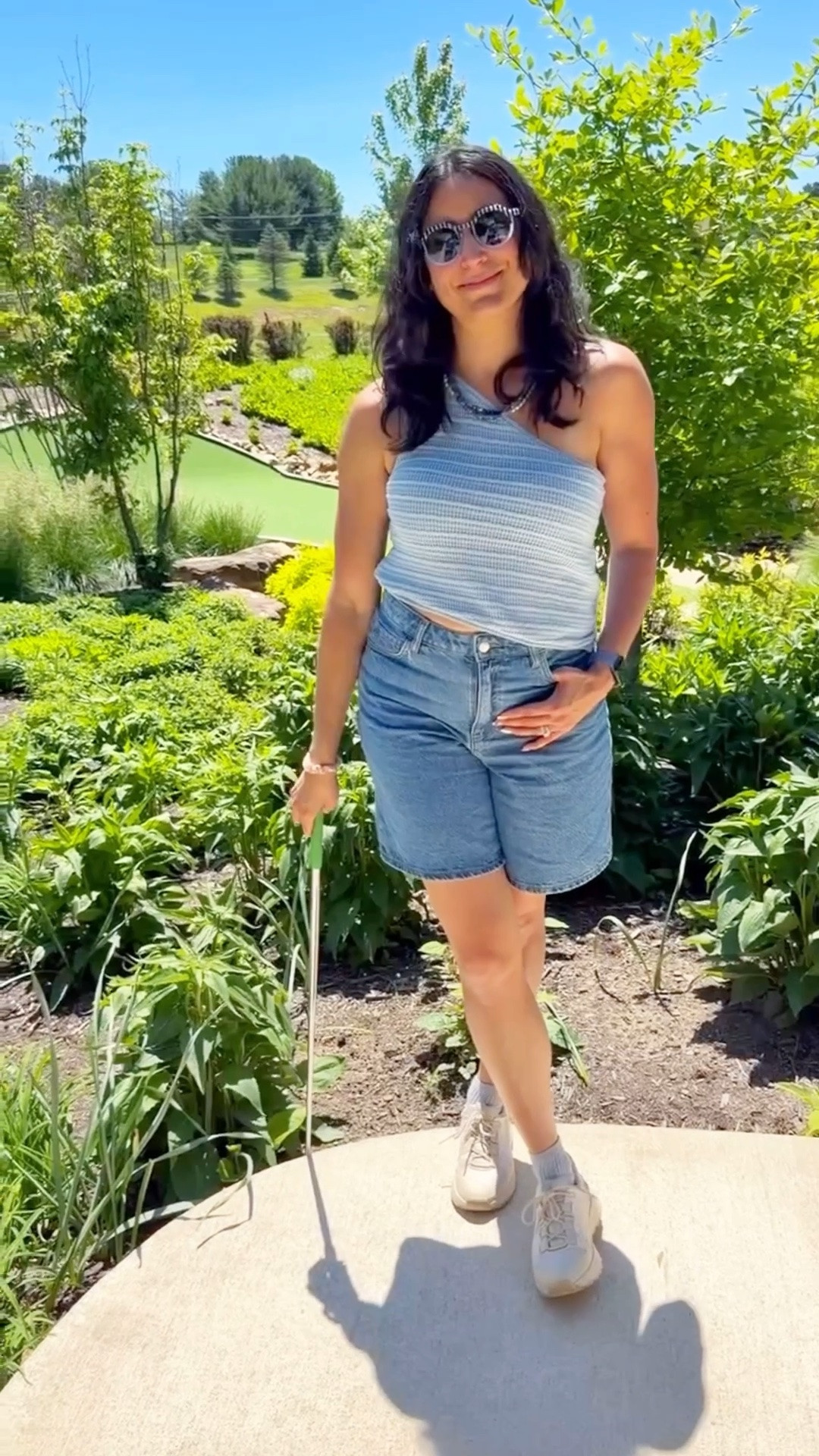 A family mini golf game wrapped up our time at the most amazing resort in Pennsylvania ⛳️ 

We kept it cool and casual (despite what the last clip of me shows 😂). 

I’ve worn this one shoulder top from American Eagle a bunch of times already. It’s super comfy and looks so cute. 

Got my usual size medium and I actually think I could’ve sized down!

Shorts are from Mango and I’ve shared them a bunch but they’ve been a go to for me on hot days. 

Full family matching outfit video dropping soon (some sure you follow me so you don’t miss it 😉). I’ve linked what my 4 year old was wearing too even though he’s not in this video. 

Save for casual summer outfit or travel outfit inspo, find more like this in my Summer Style collection, and follow me for more ✨

easy summer outfit • summer look • vacation look • vacation outfit • beach outfit • family coordinating • family matching • family outfits • mom and son • mom and boys • mom and baby

#LTKootd #LTKdayinmylife #LTKKids