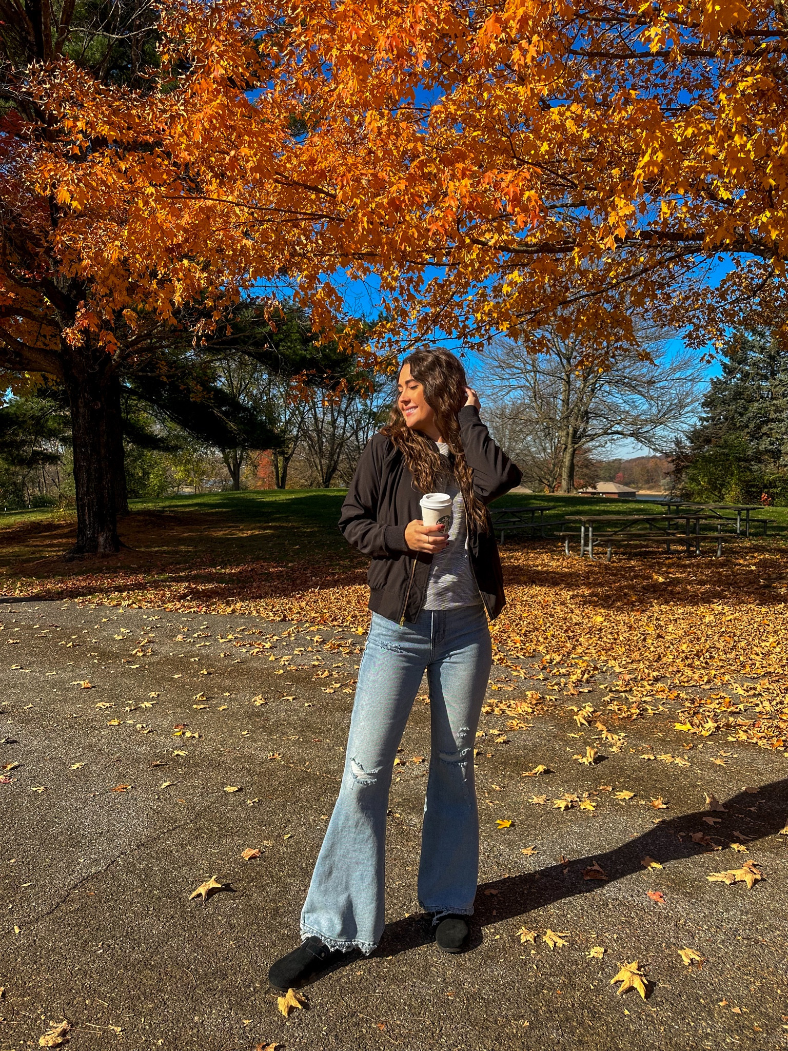 Fall outfit 🤎 the quality material of the honeycomb top and black bomber is AMAZING. 
Exact clogs are linked as well. Flare jeans are from tj maxx but I linked a similar pair from hollister🩵

#LTKGiftGuide #LTKtravel #LTKSeasonal