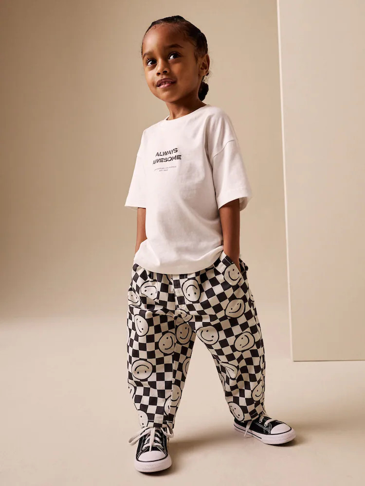 Black/Neutral Happy Face Checkerboard Barrel Pull On Trousers (3mths-7yrs) | Next US