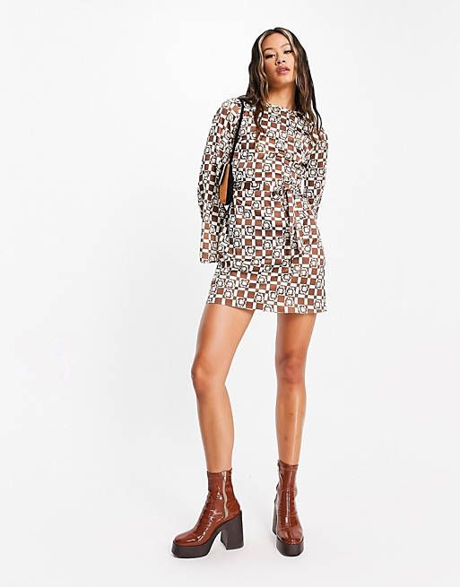 ASOS DESIGN fluted sleeve mini dress with tie belt in 70s print | ASOS (Global)