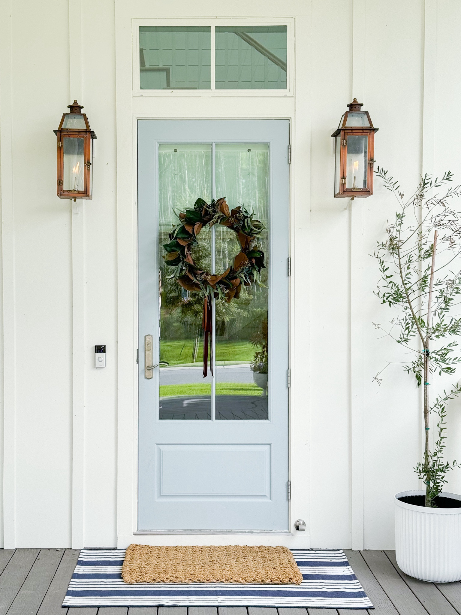 Our front porch decorated for fall! Includes this cute wreath with velvet ribbons (on sale!), striped rug, jute wrong, fluted planter and copper gas lanterns. See even more ideas here: https://lifeonvirginiastreet.com/fall-front-porch-ideas/.
.
#ltkhome #ltkseasonal #ltksalealert #ltkfindsunder50 #ltkfindsunder100 #ltkstyletip coastal fall decor, front door decor, front porch ideas

#LTKFindsUnder50 #LTKSeasonal #LTKHome