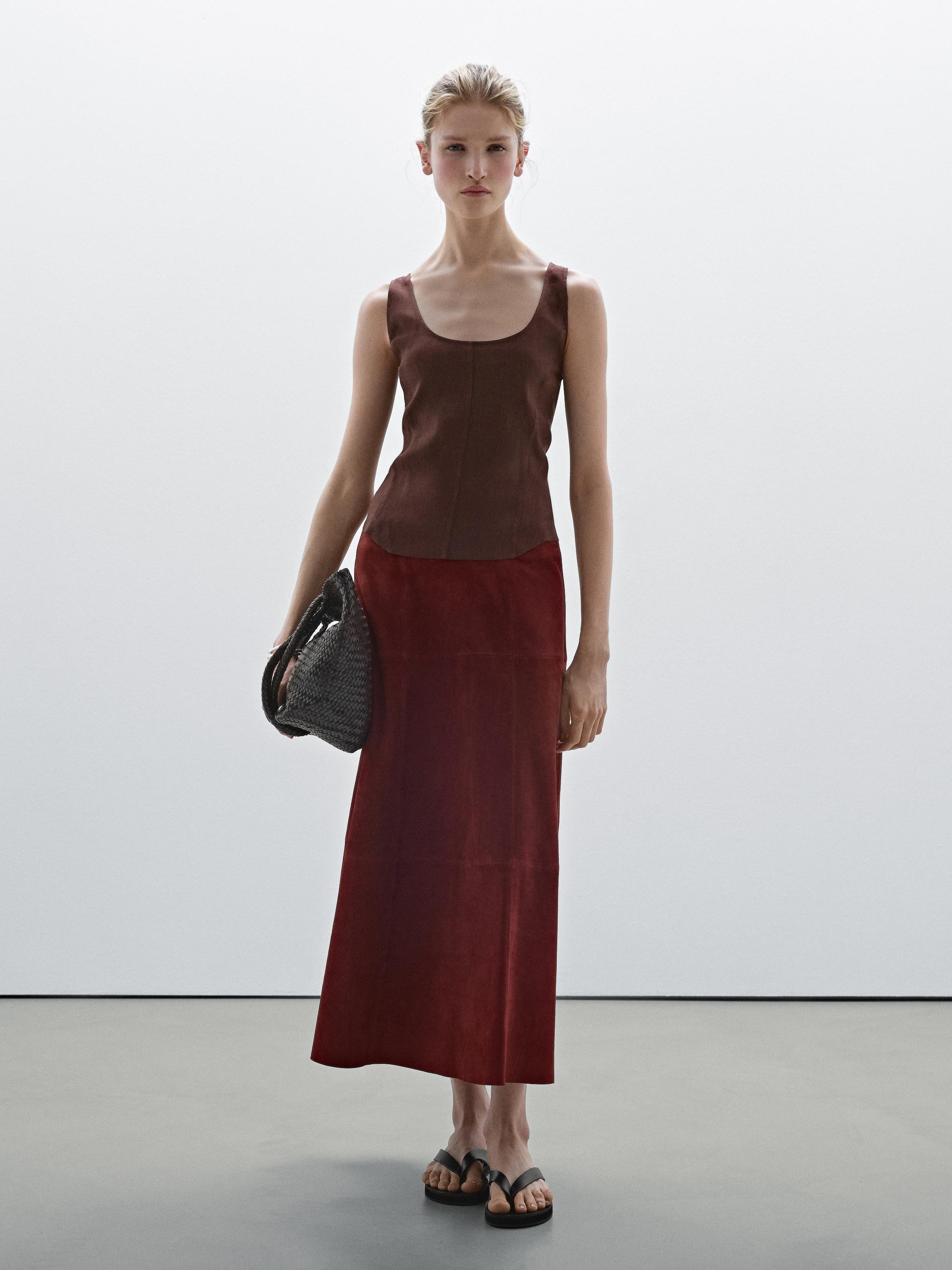 Top made of a linen blend fabric. Crew neck. Straps. Seam details . Stretch fabric. | Massimo Dutti UK