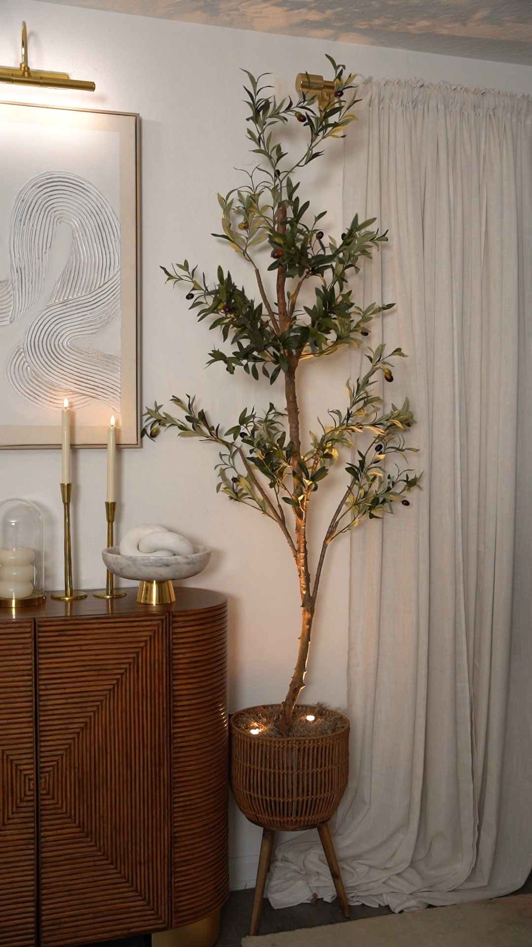 I never knew I’d need so many battery powered lights in my home. They really do elevate the space and now I’m obsessed and desperately need a jumbo pack of AA batteries to keep up. I got these on Amazon and you can find them in my LTK

#batterypoweredwirelesslighting #batterypoweredspotlight #amazonhomefinds #amazonhomedecor 
Olive tree, faux tree, Amazon home finds, battery powered lights 


#LTKFindsUnder50 #LTKHome #LTKFindsUnder100